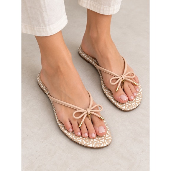 kate spade Shoes - Kate Spade Tan Bow Thong
Sandals with Gold Heart Detail | Size 9.5